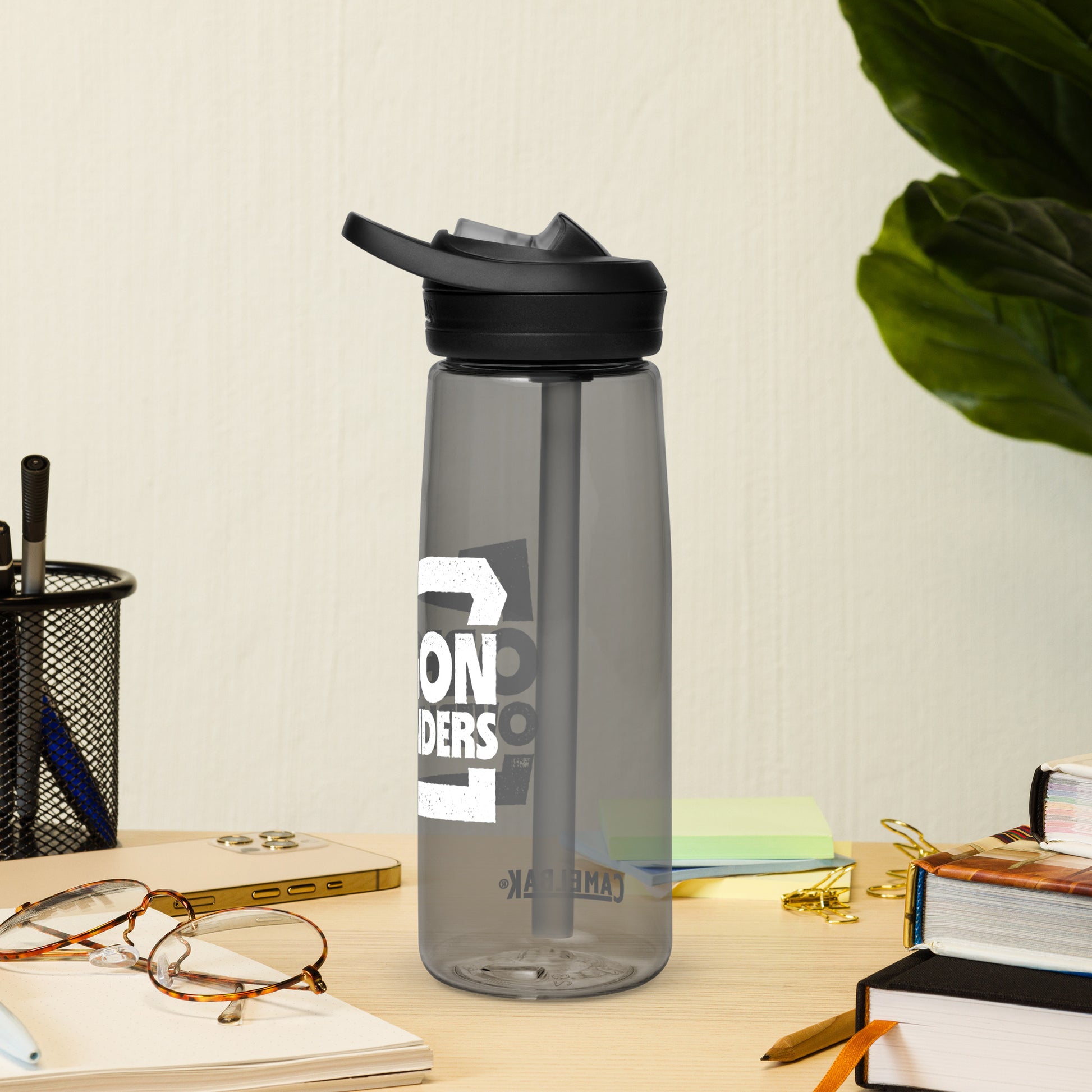 https://merch-mkt.com/cdn/shop/files/sports-water-bottle-charcoal-back-64e7d9d04ddb5.jpg?v=1692916399&width=1946